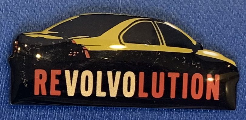 Revolvolution Pin